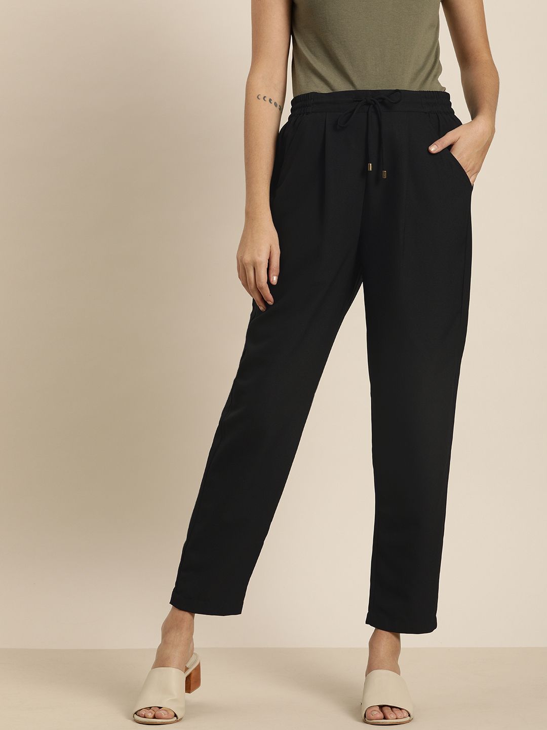 all about you Women Black Slim Fit Solid Trousers Price in India