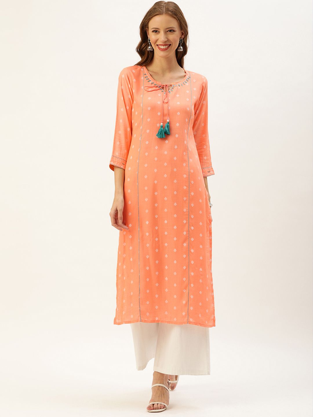 Rajnandini Women Orange Printed Straight Kurta Price in India