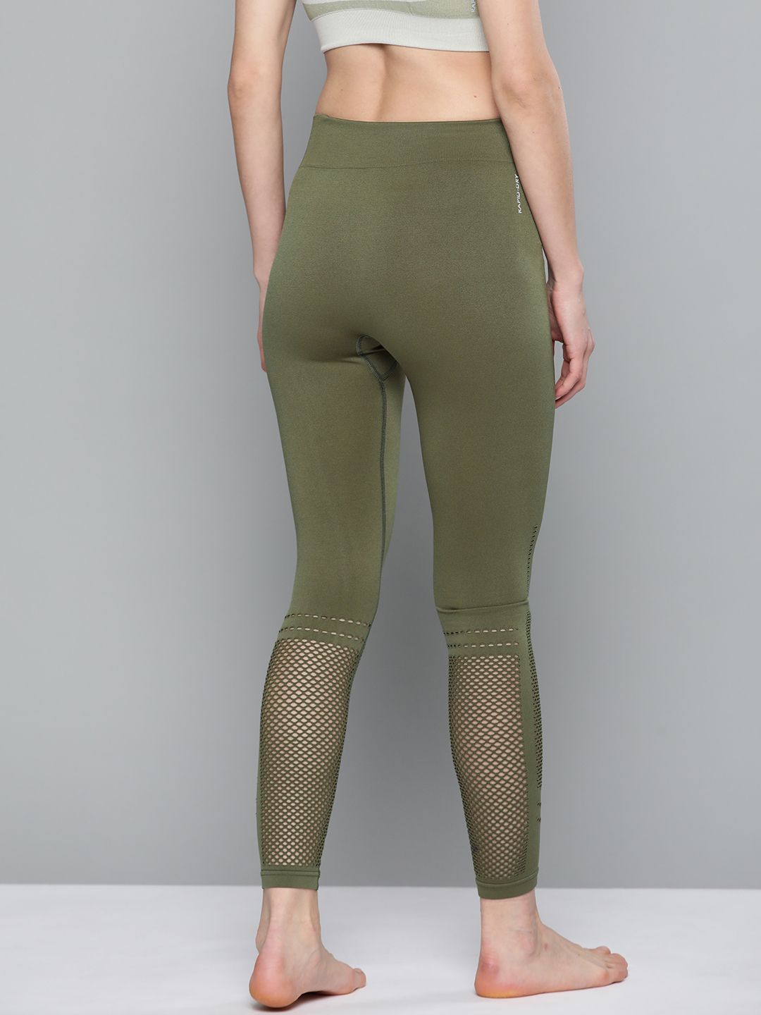 HRX By Hrithik Roshan Women Deep Lichen Solid Skinny Fit Seamless Rapid-Dry Antimicrobial Yoga Tights Price in India
