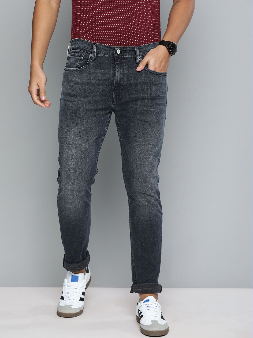 Levis Men Blue Tapered Fit Mid-Rise Clean Look Jeans