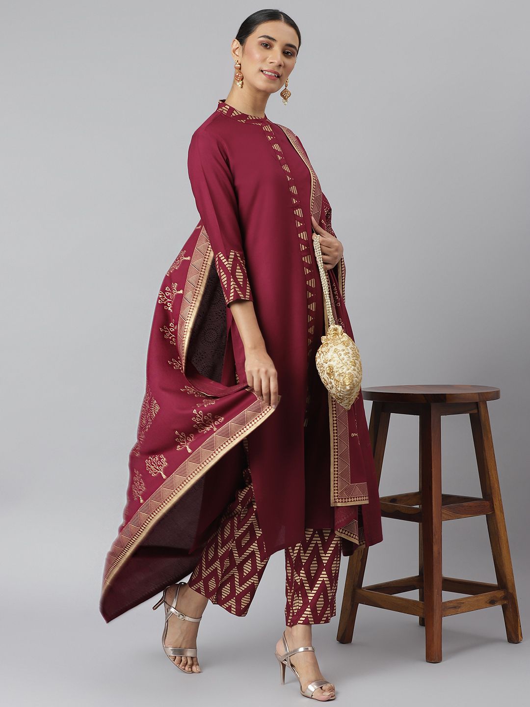 Khushal K Women Maroon Solid Kurta with Trousers & Dupatta Price in India