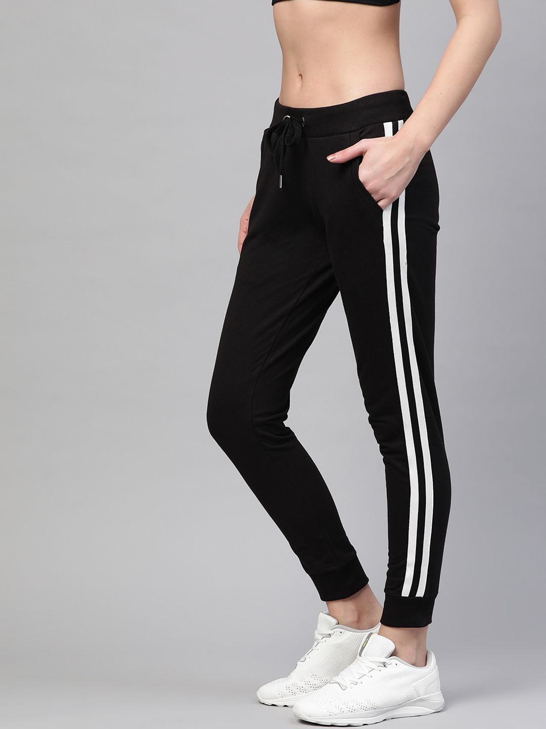 M7 by Metronaut Women Black Taping Detail Solid Joggers Price in India