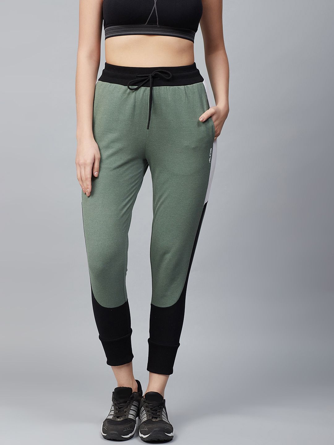 Alcis Women Olive Green & Black Solid Joggers Price in India