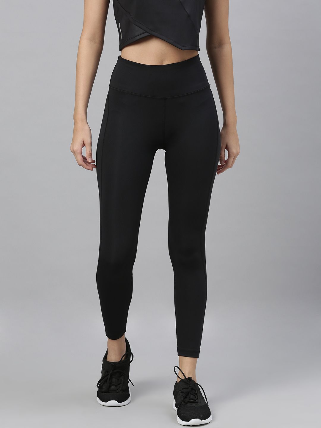 Nike Women Black Solid Epic Fast Running Tights Price in India