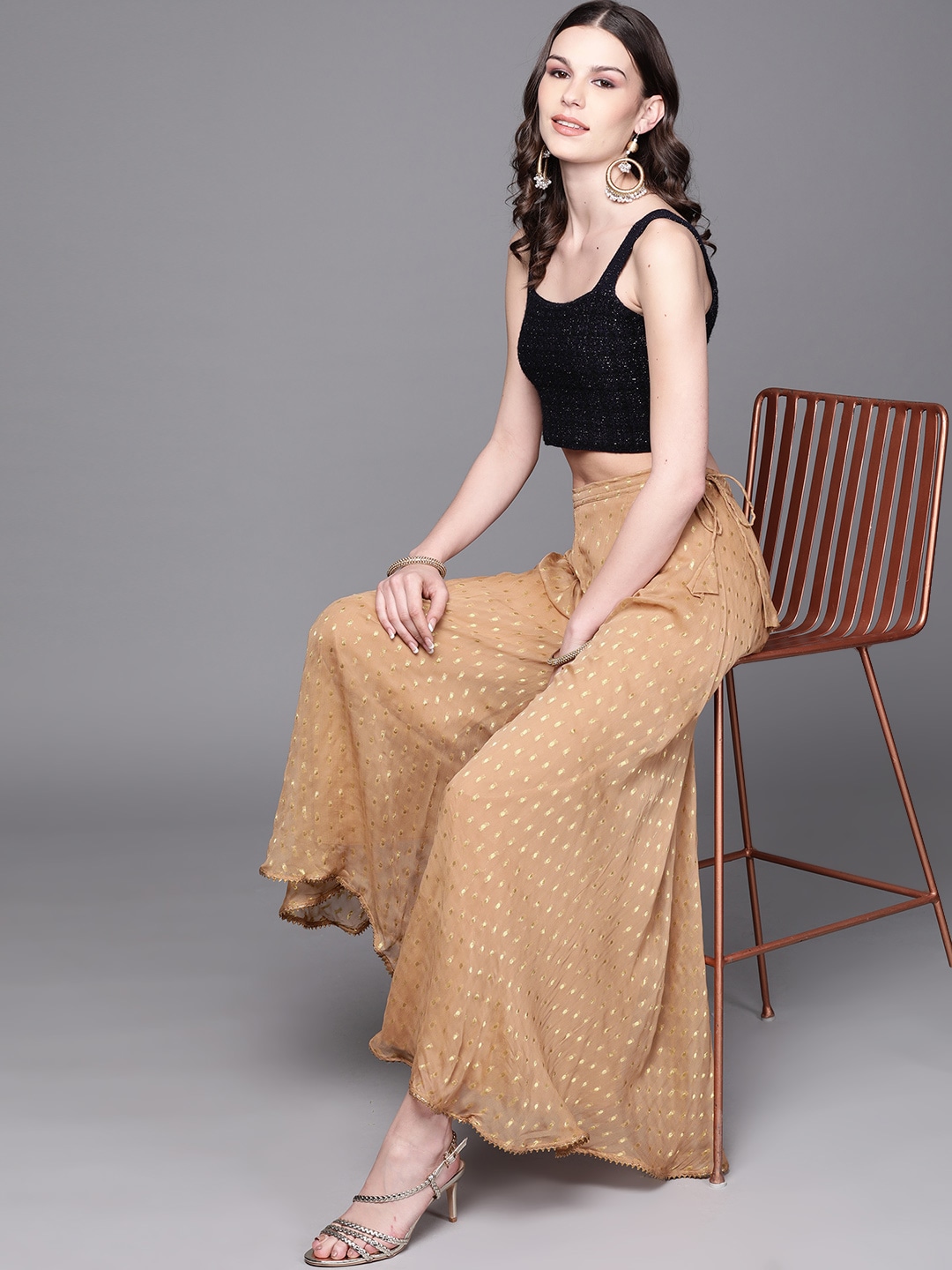 Inddus Women Beige & Golden Woven Design Flared Palazzos Price in India