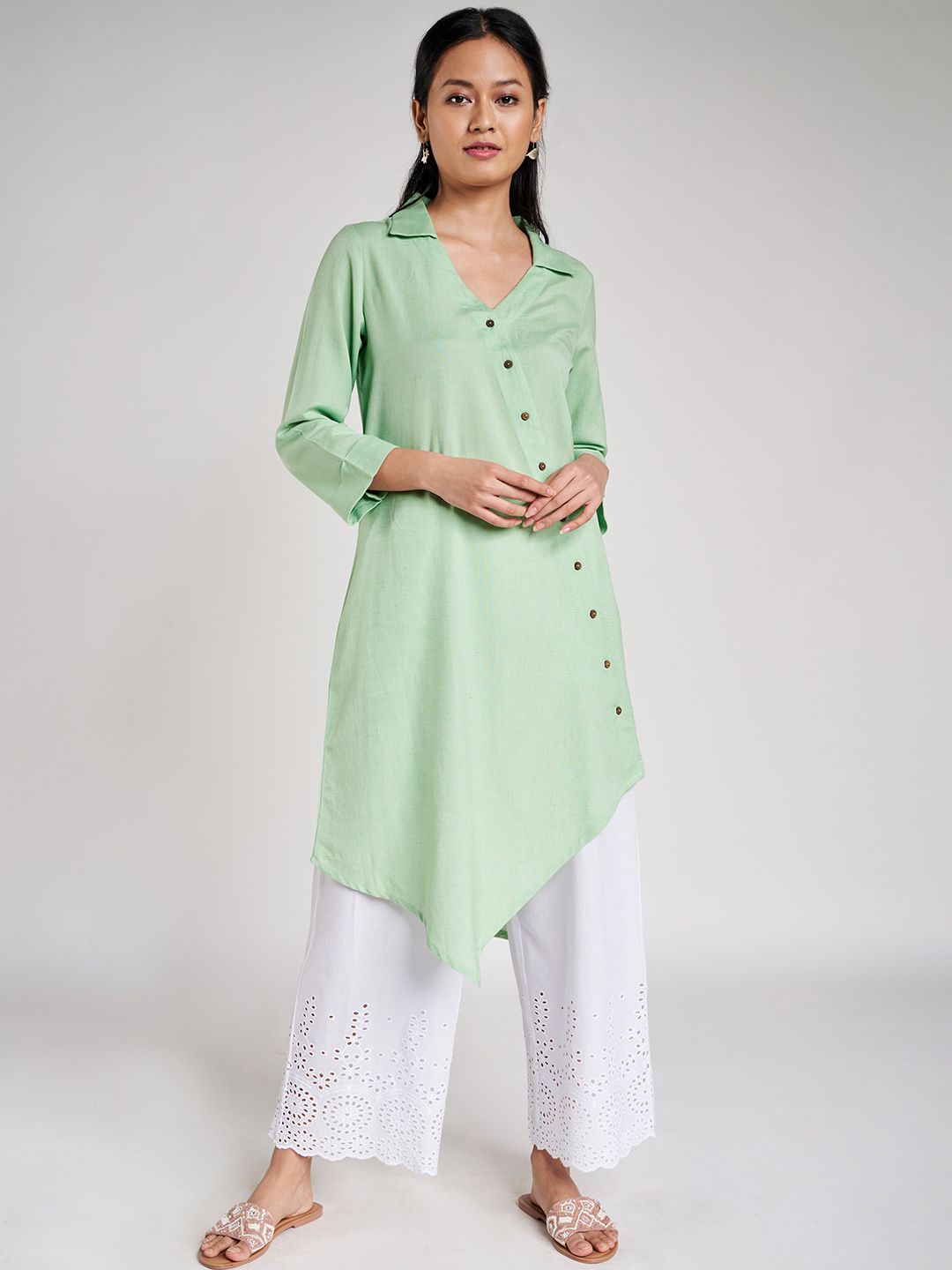Global Desi Women Green Solid Ecovero Asymmetric Tunic Price in India