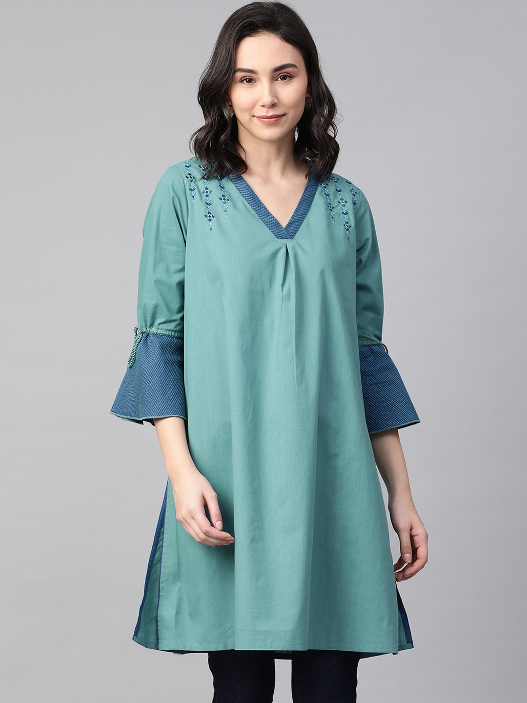 Global Desi Women's Green Solid Pure Cotton Tunic Price in India