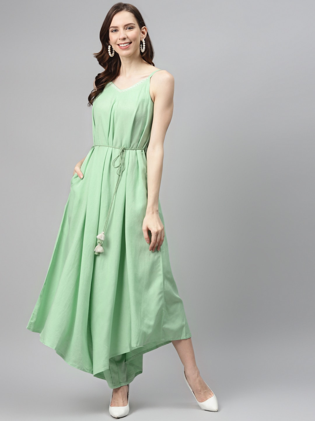 Global Desi Women Green Solid Asymmetric Basic Jumpsuit Price in India