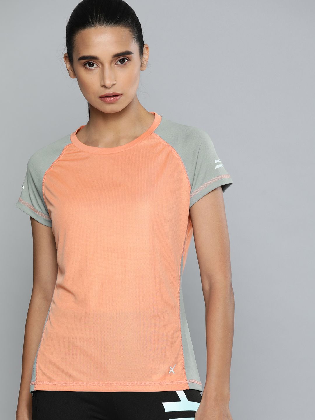 HRX by Hrithik Roshan Women Peach-Coloured Colourblocked Round Neck T-shirt Price in India