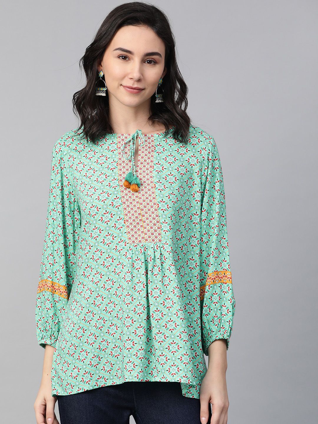 Global Desi Green & Red Sustainable Printed Tie-Up Neck Puff Sleeves Top
