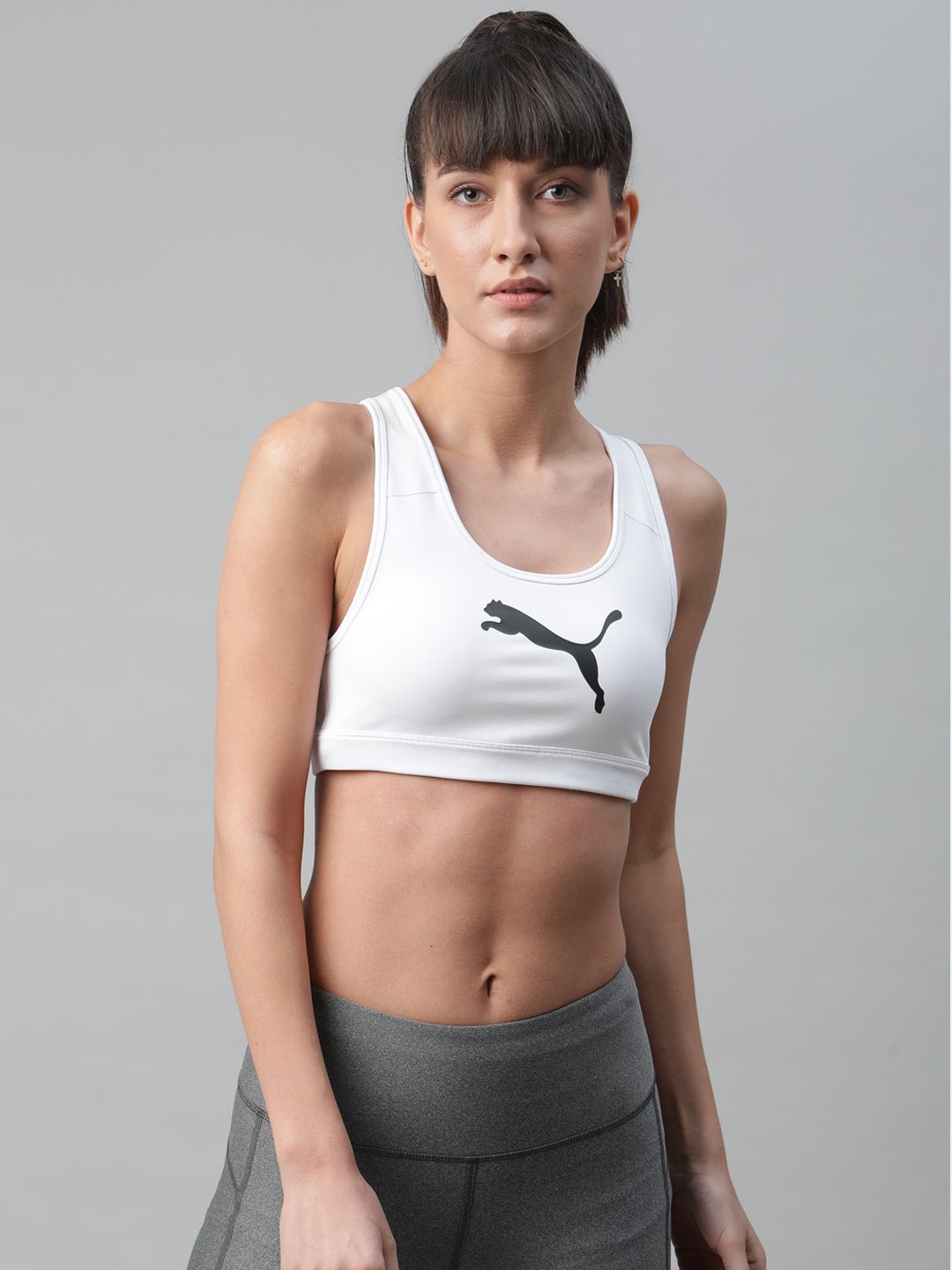 Puma White Printed Non-Wired Lightly Padded Mid Impact 4Keeps Sports Bra Price in India