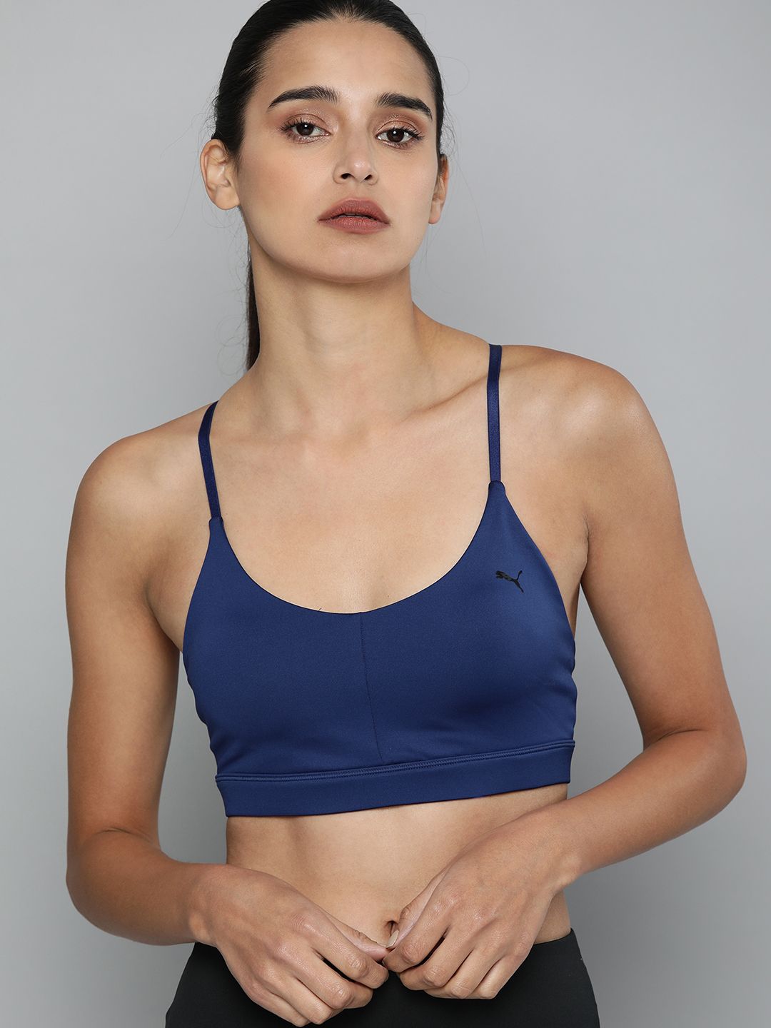 Puma Navy Blue Solid Non-Wired Lightly Padded Low Impact Strappy Training Bra Price in India