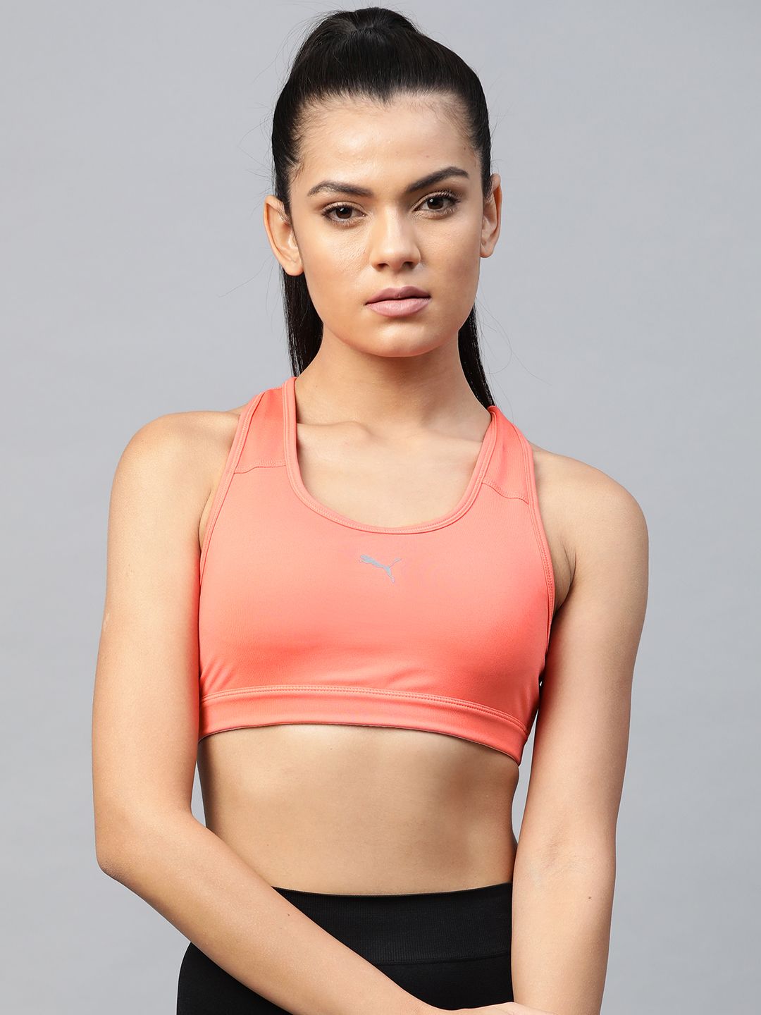Puma Women Peach-Coloured Solid Mid Impact 4Keeps Removable Padding Workout Bra 52030524 Price in India