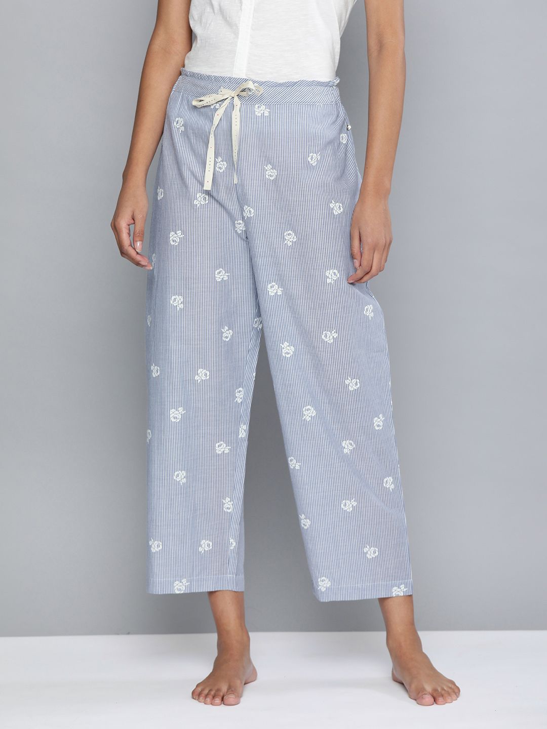 Chemistry Women Blue & White Striped Cropped Lounge Pants With Floral Prints Price in India