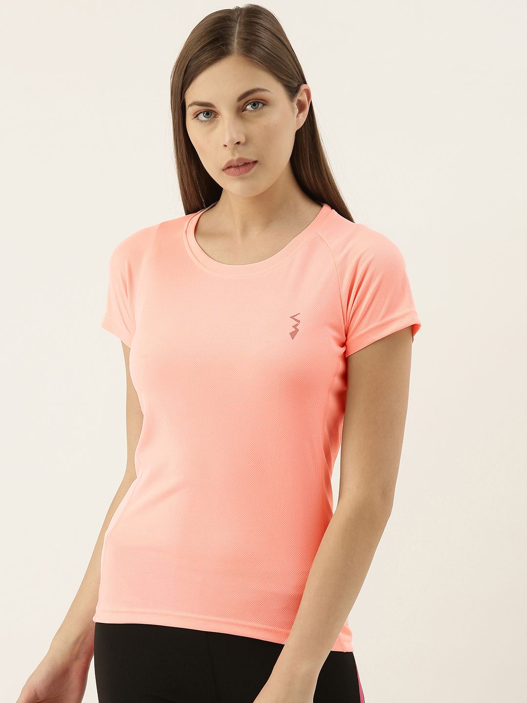 Campus Sutra Women Peach-Coloured Solid Round Neck Running T-shirt Price in India