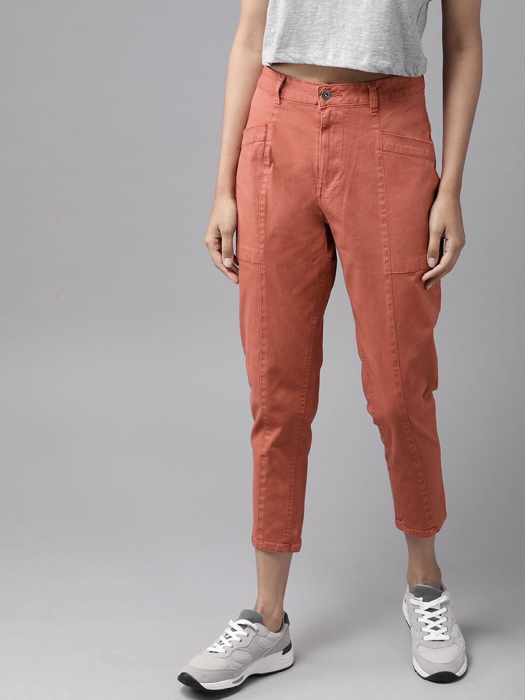 The Roadster Lifestyle Co Women Coral Orange Loose Fit Solid Cropped Regular Trousers Price in India