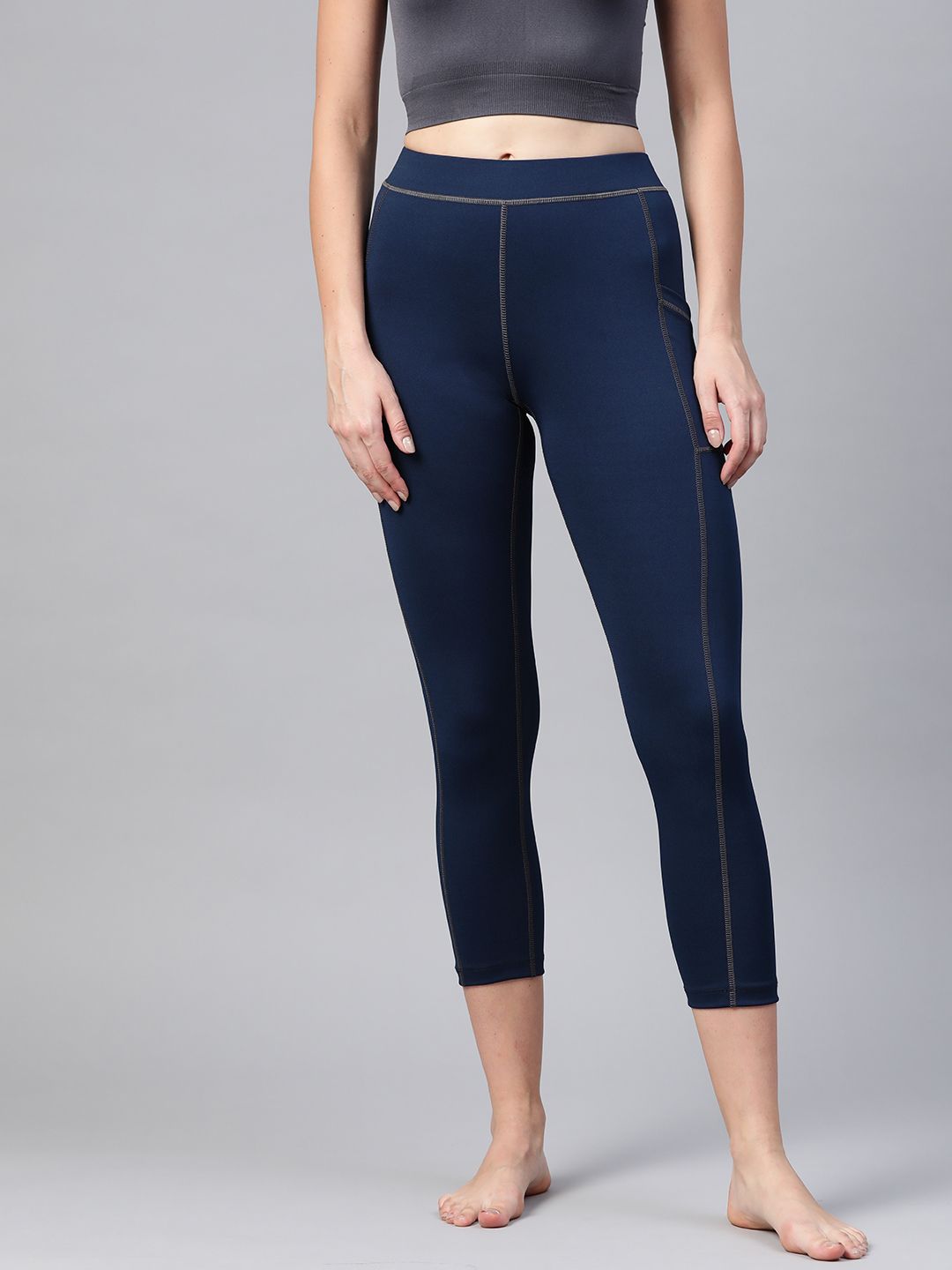 Chkokko Women Navy Blue Solid Cropped Yoga Tights Price in India