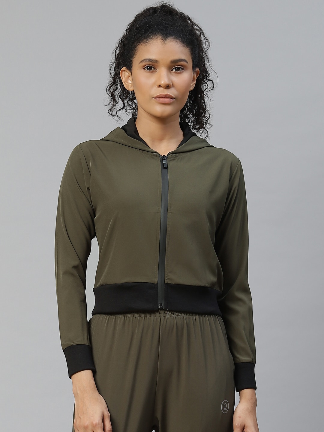 Chkokko Women Olive Green Solid Hooded Crop Sporty Jacket Price in India