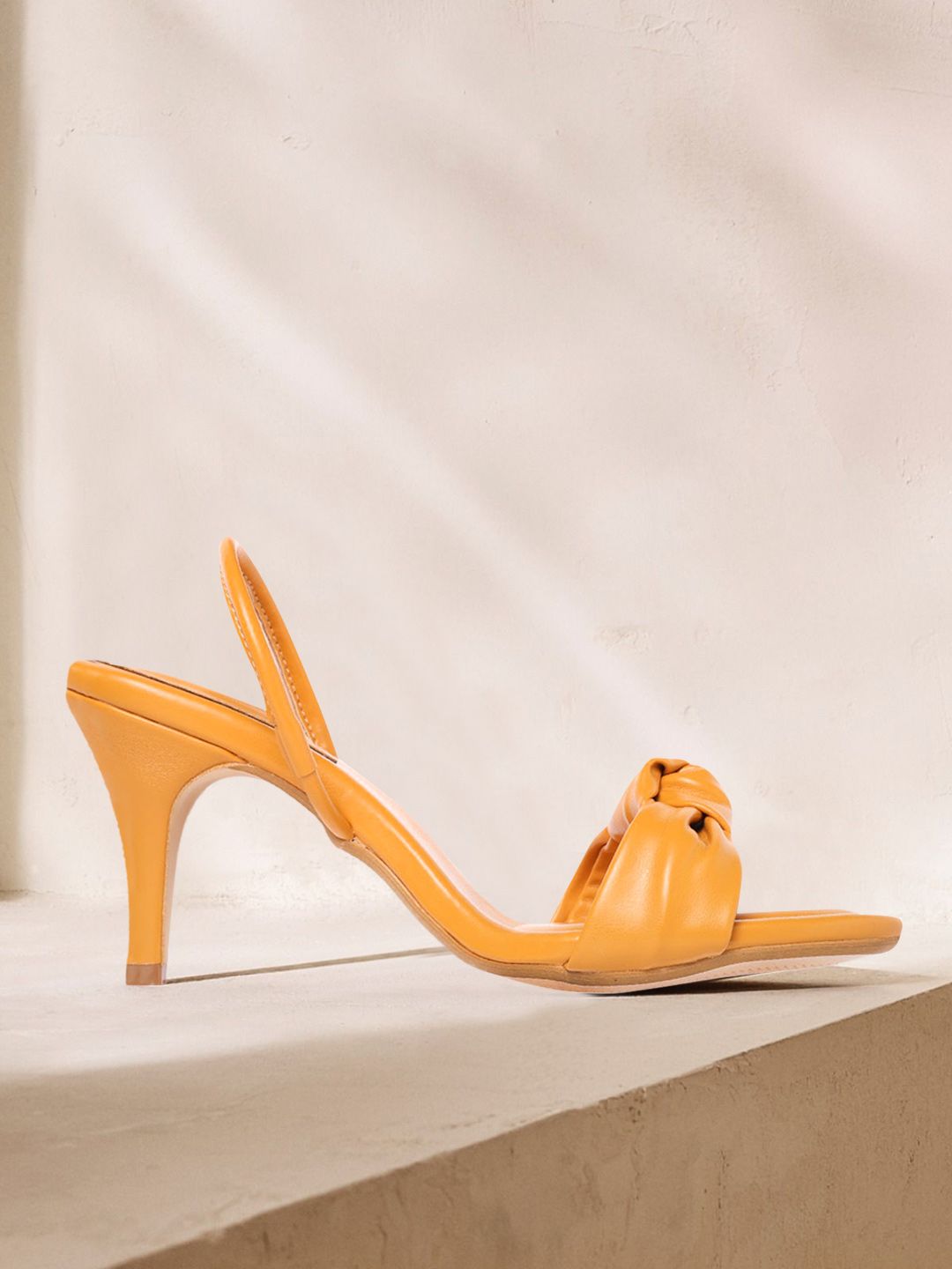 CORSICA Women Mustard Yellow Knot Detail Slim Heels Price in India