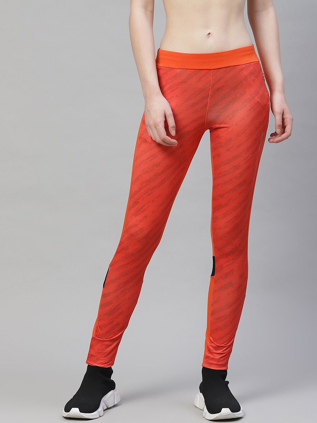 Alcis Women Orange & Grey Abstract Print Tights Price in India