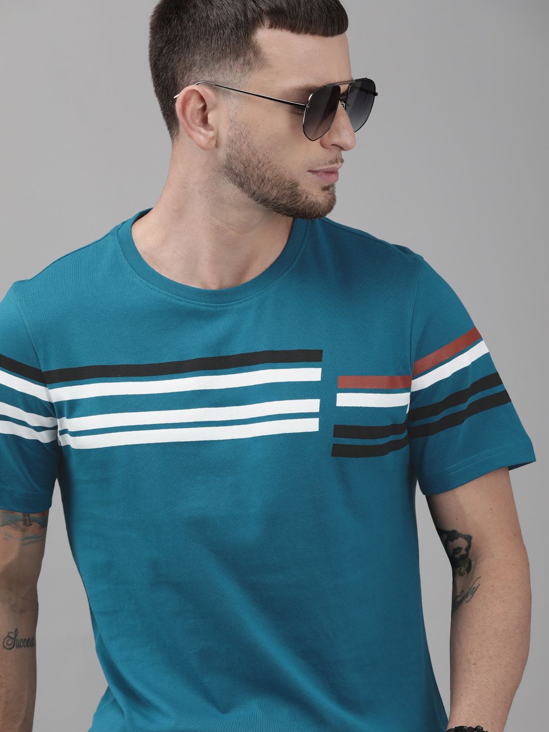 Roadster Men Teal Blue & White Striped Round Neck T-shirt