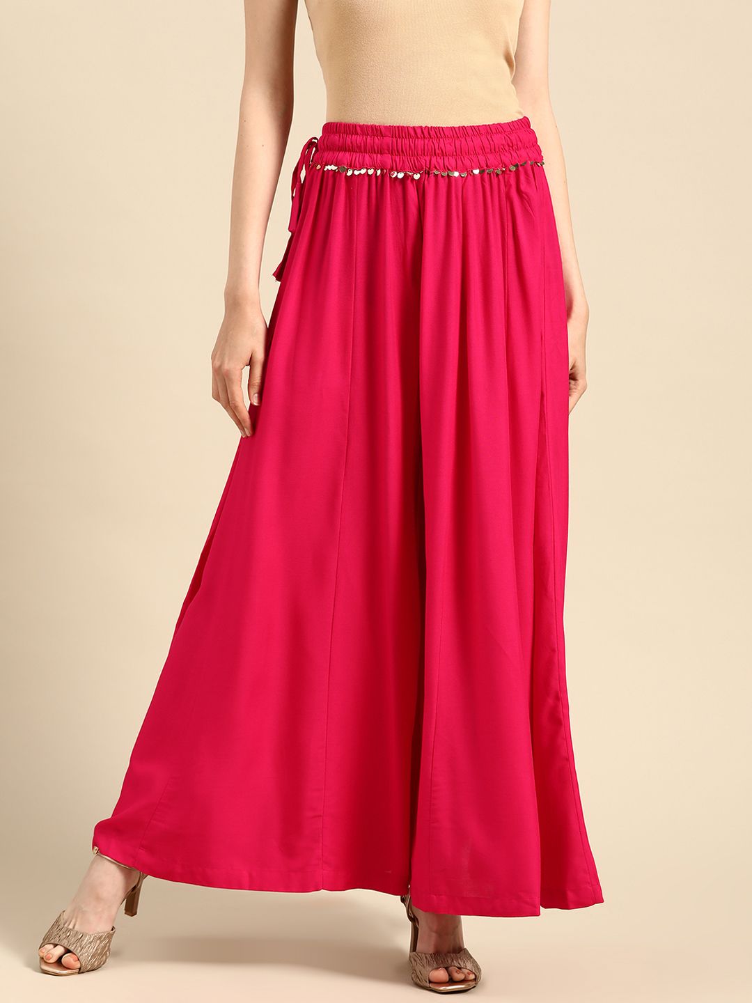 TAG 7 Women Magenta Solid Flared Palazzos Price in India