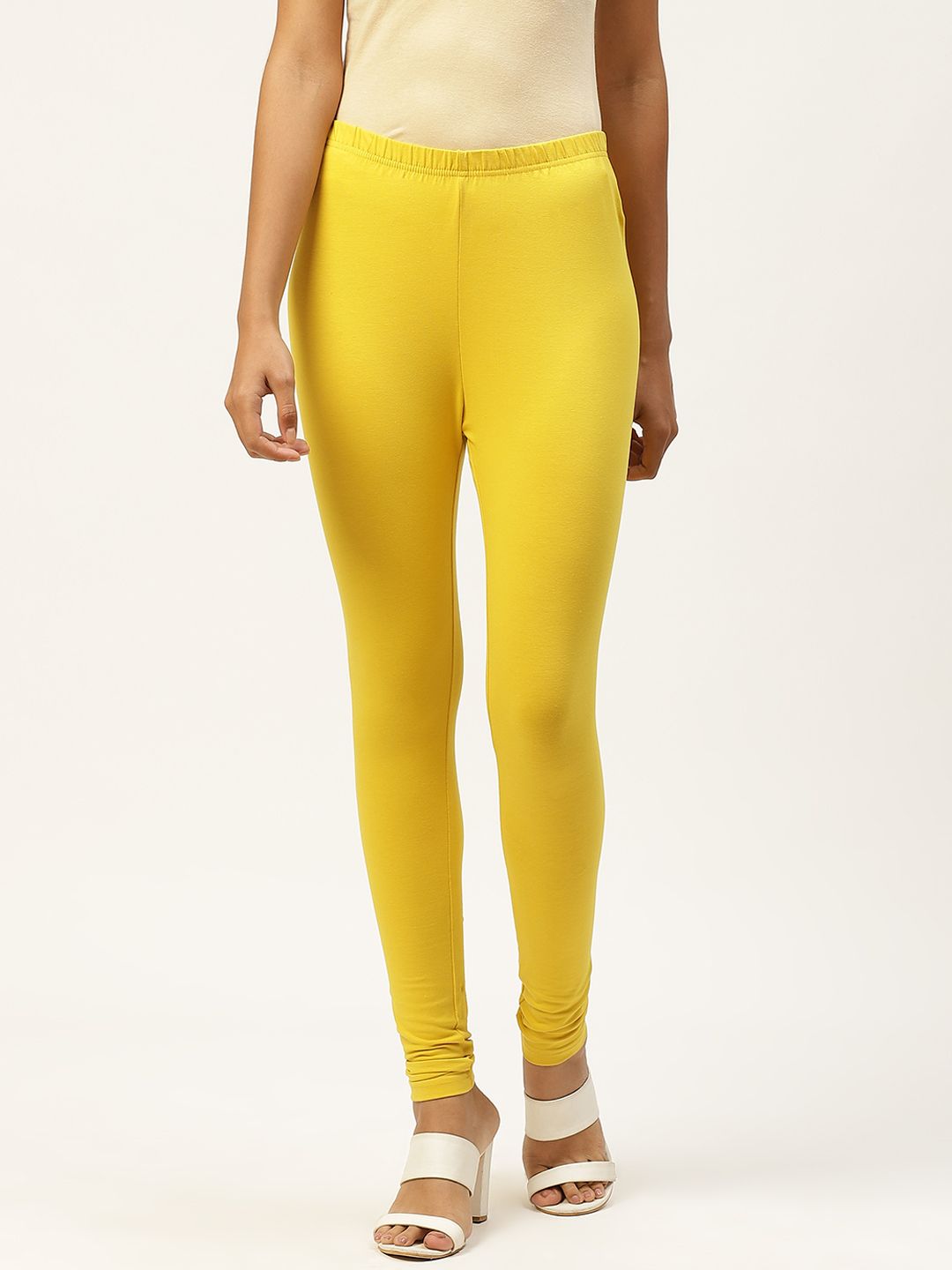 Monte Carlo Women Yellow Solid Knitted Pure Cotton Churidar Leggings Price in India