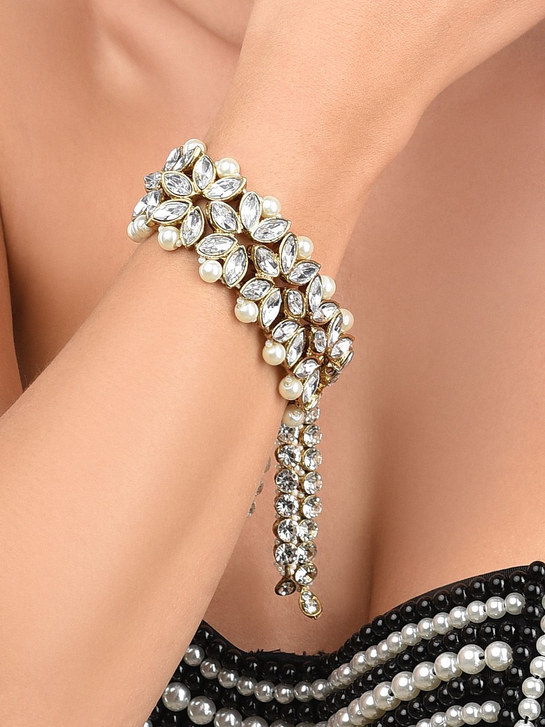 Zaveri Pearls Gold-Plated Crystal Studded Wedding Collection Cuff Bracelet Price in India