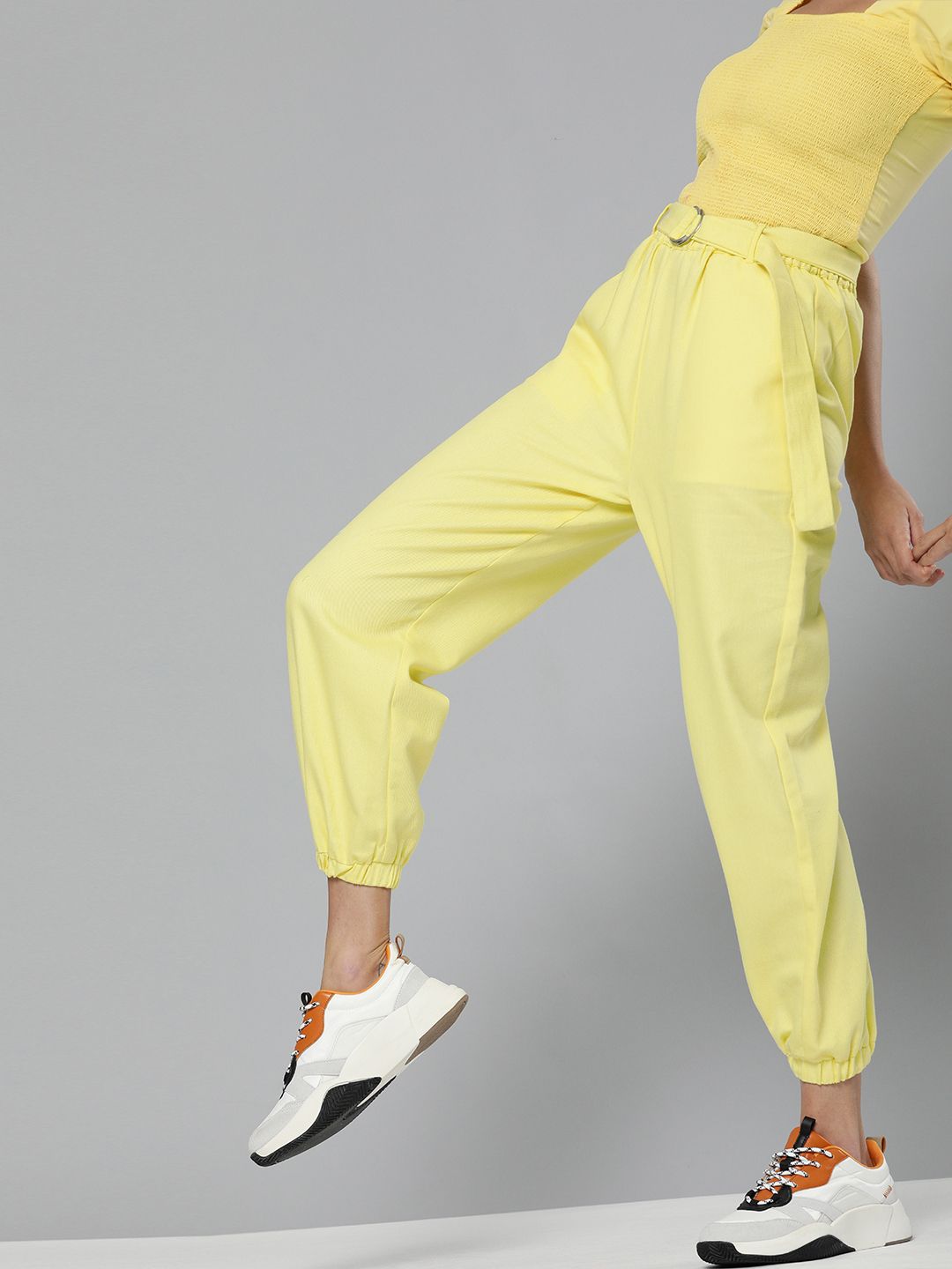 SASSAFRAS Women Yellow Regular Fit Solid Cropped Joggers Price in India
