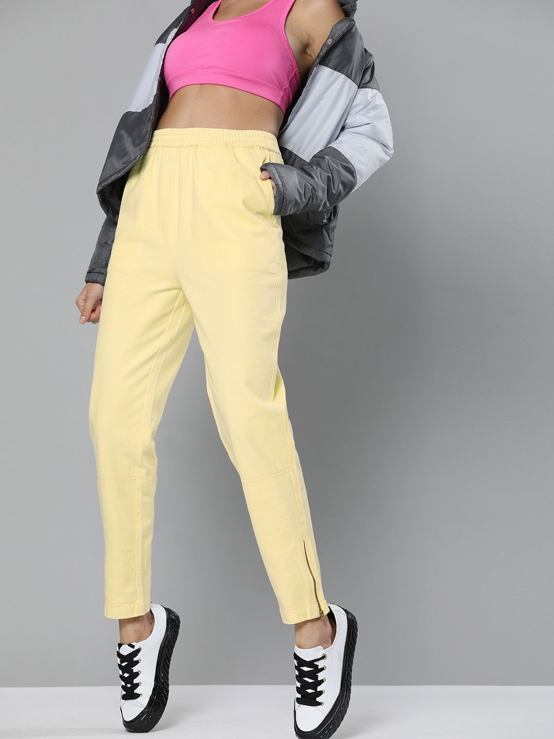 SASSAFRAS Women Yellow Regular Fit Solid Regular Zipper Trousers Price in India