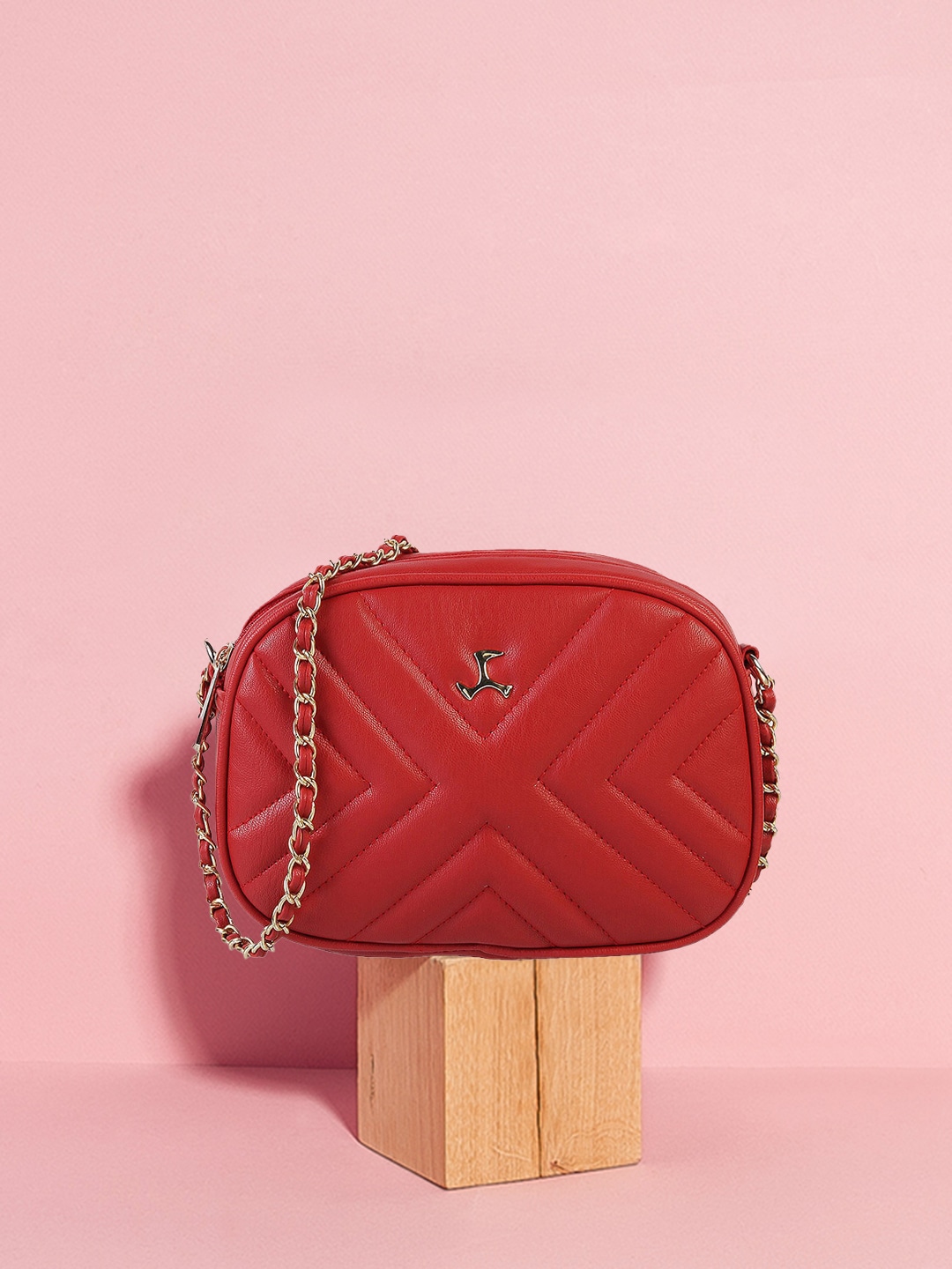 Mochi Red Textured Sling Bag Price in India