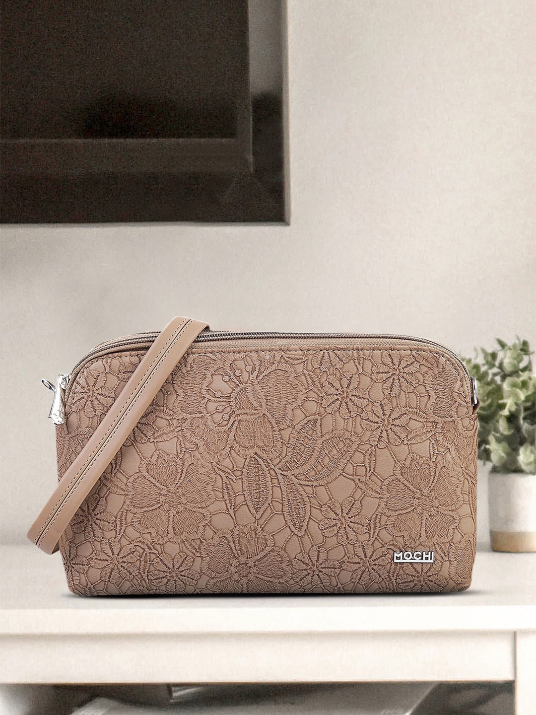 Mochi Brown Textured Sling Bag Price in India