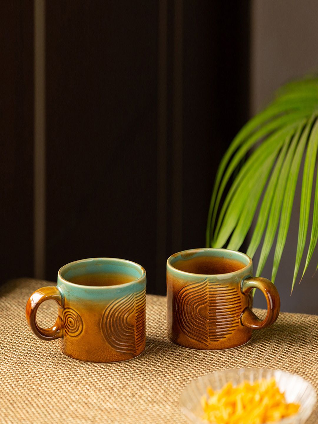 ExclusiveLane Set of 2 Brown & Sea Green Hand-Engraved Ceramic Coffee Mugs Price in India