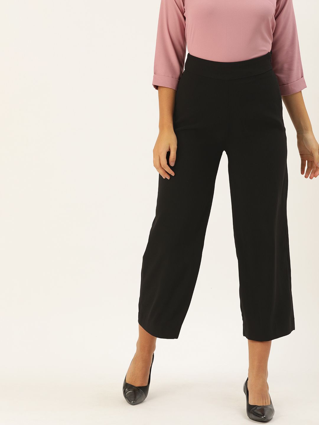AND Women Black Loose Fit Solid Cropped Formal Trousers Price in India