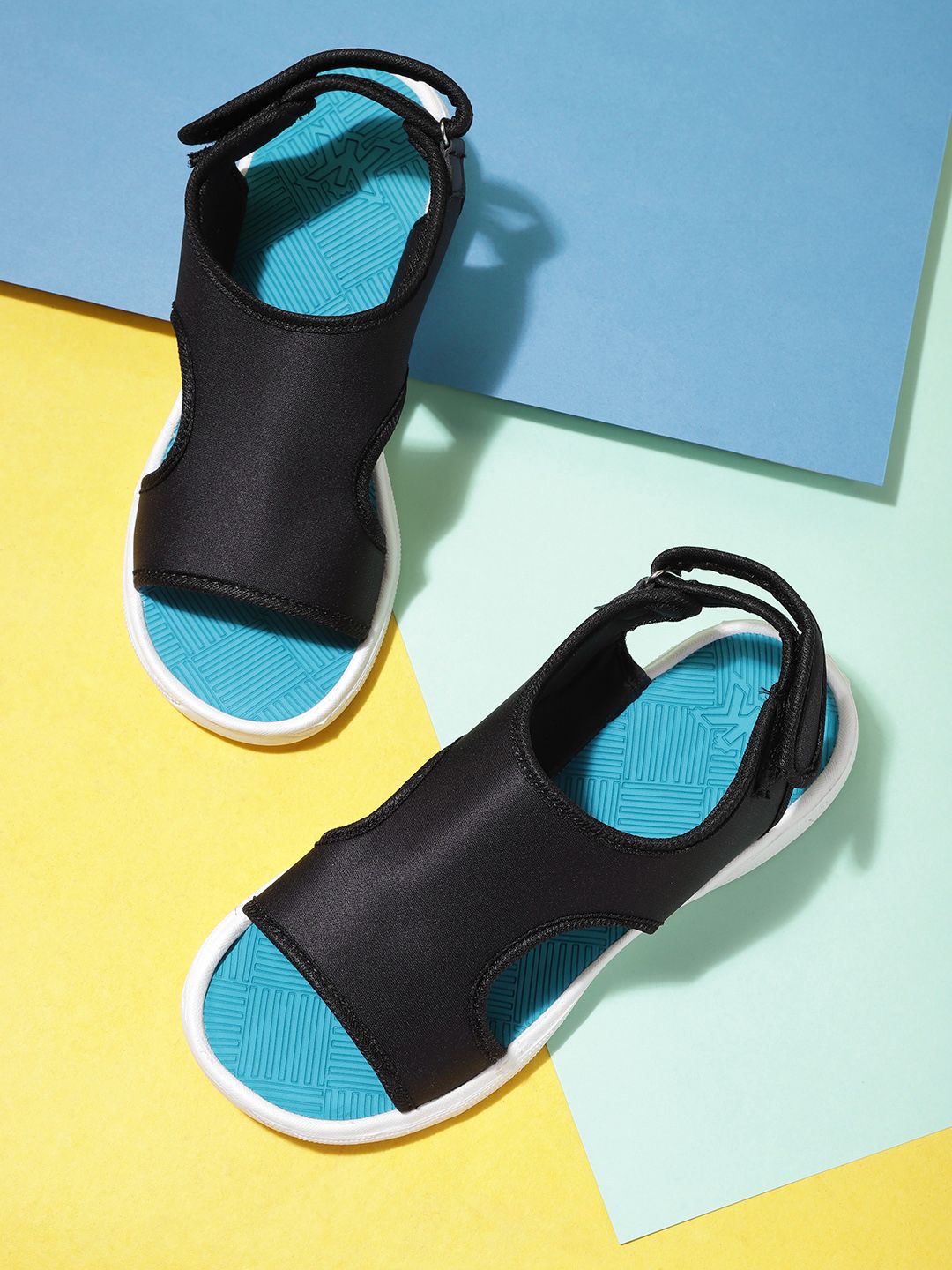 Kook N Keech Women Black Solid Sports Sandals with Cut-Out deal from myntra