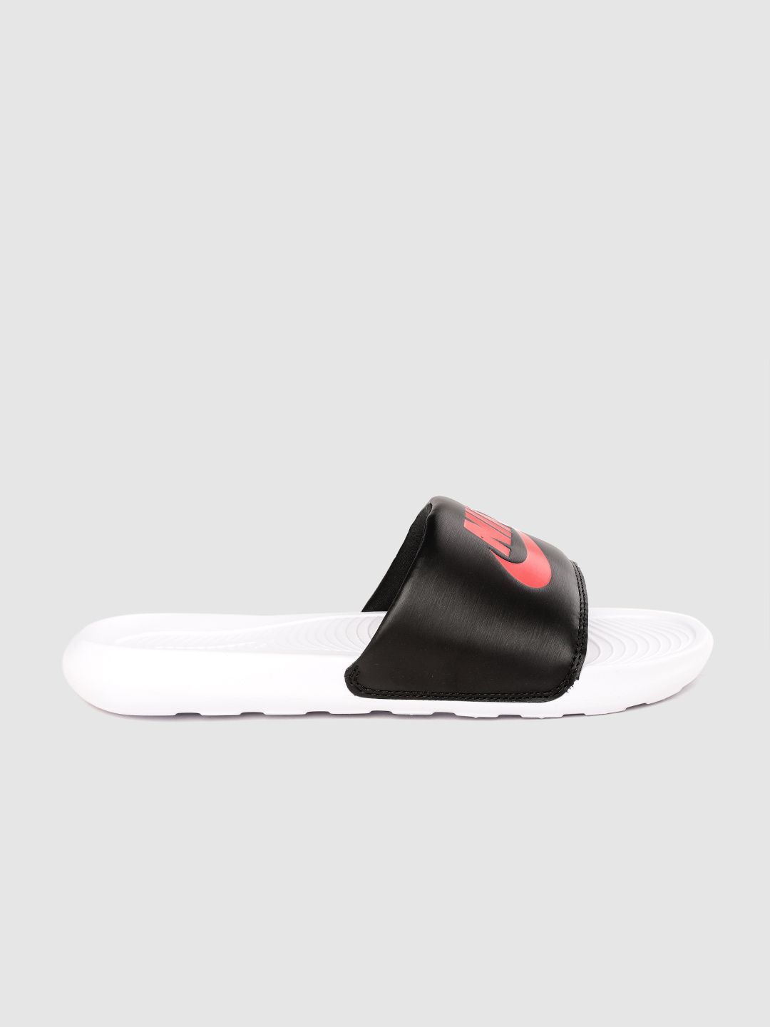 black nike slides with red check