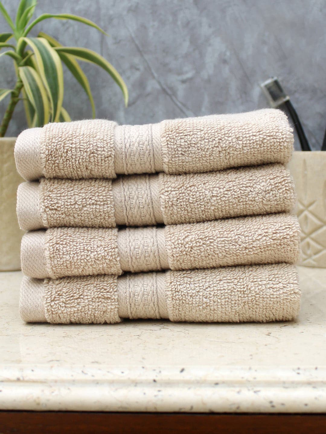 AVI Living Unisex Set of 4 Beige Solid 550 GSM Face Towels Price in India