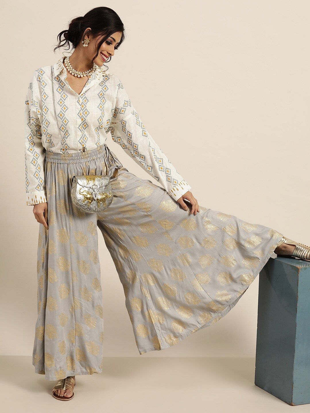 Shae by SASSAFRAS Women Grey & Golden Regular Fit Foil Printed Flared Palazzos Price in India