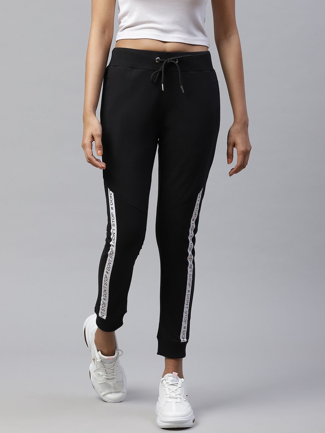 M7 by Metronaut Women Black Slim Fit Solid Joggers with Printed Detail Price in India