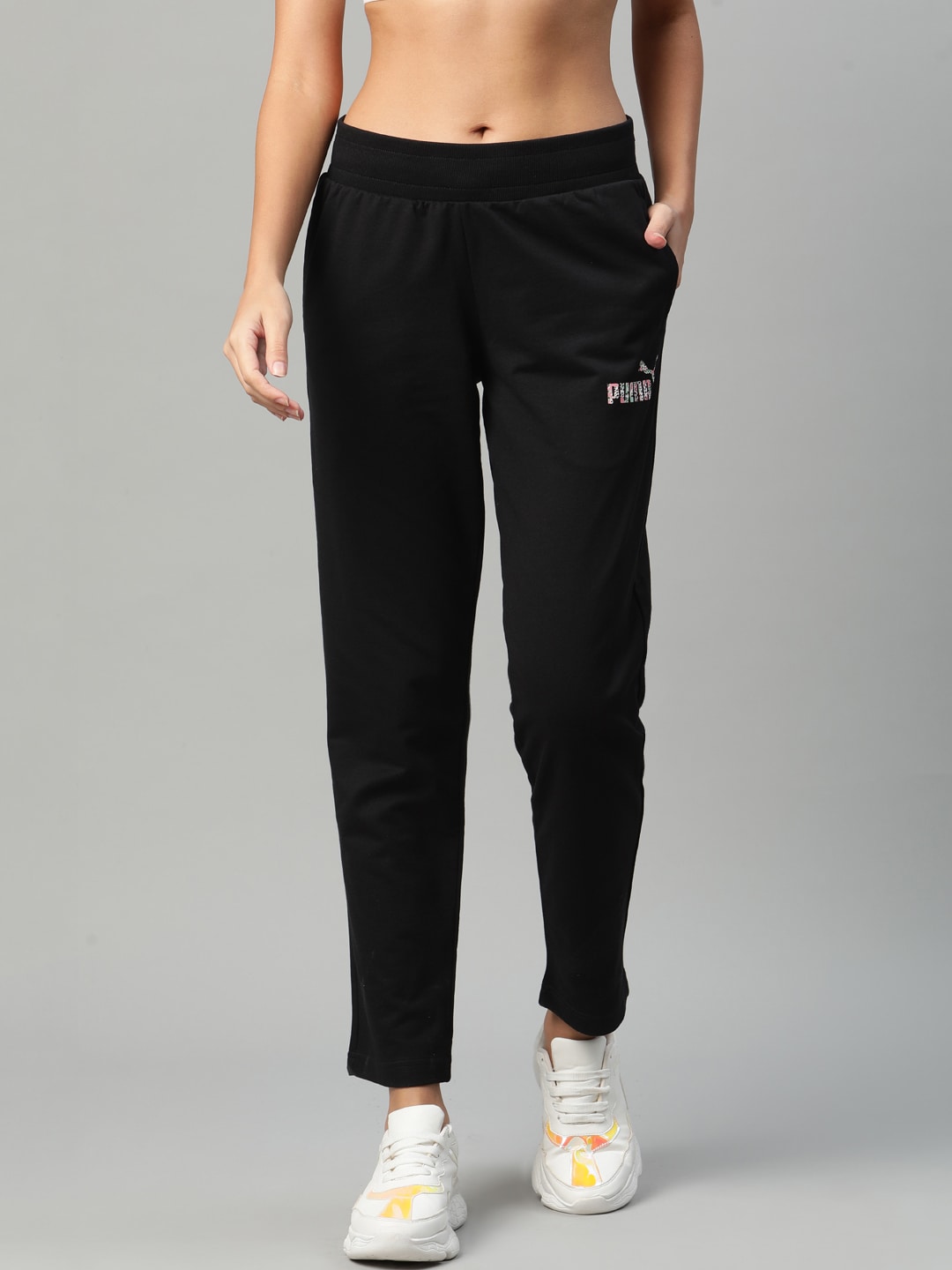 Puma Women Black Graphic 6 Solid Regular Fit Track Pants Price in India