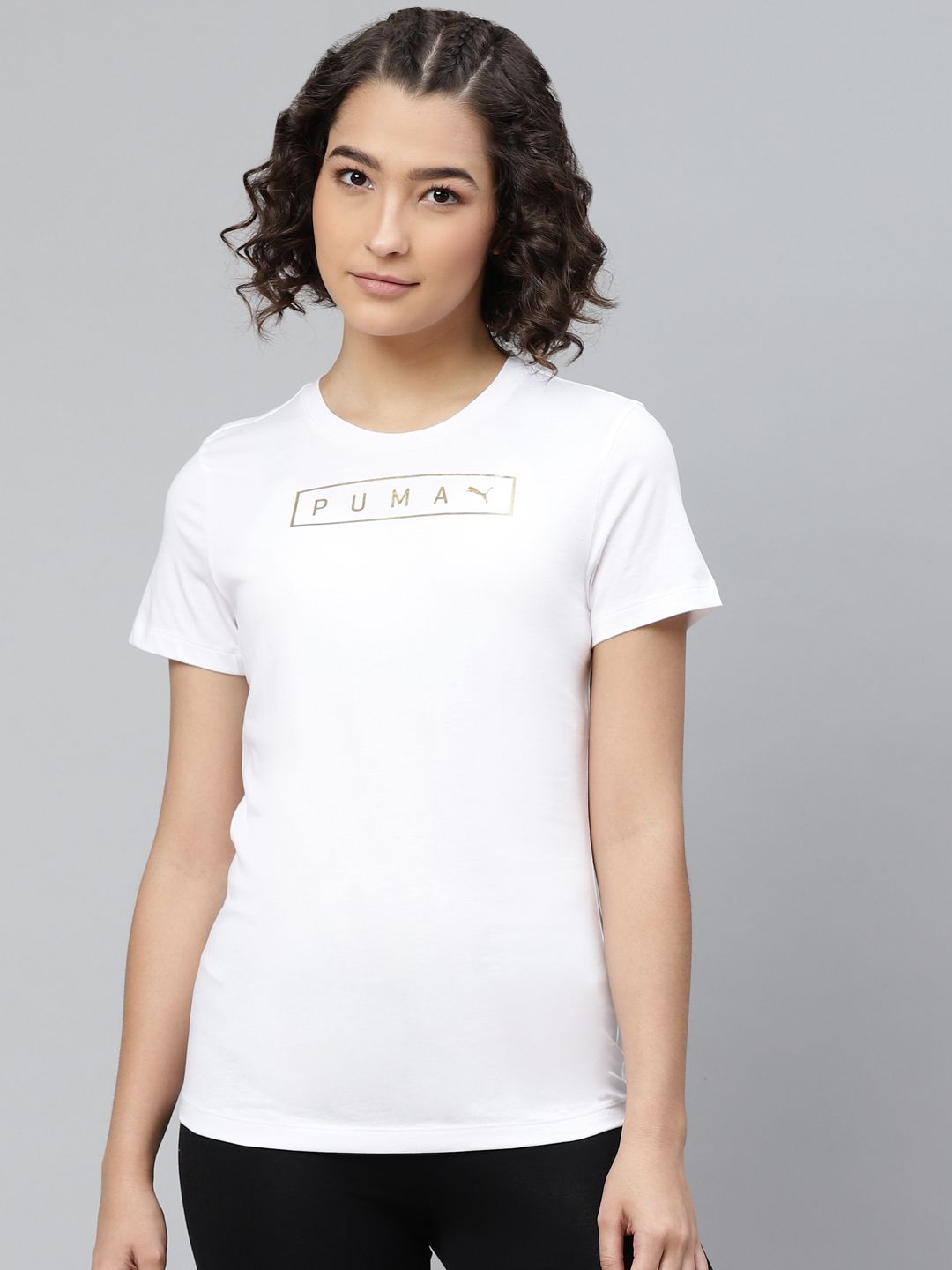 Puma Women White Solid Round Neck Pure Cotton T-shirt Price in India