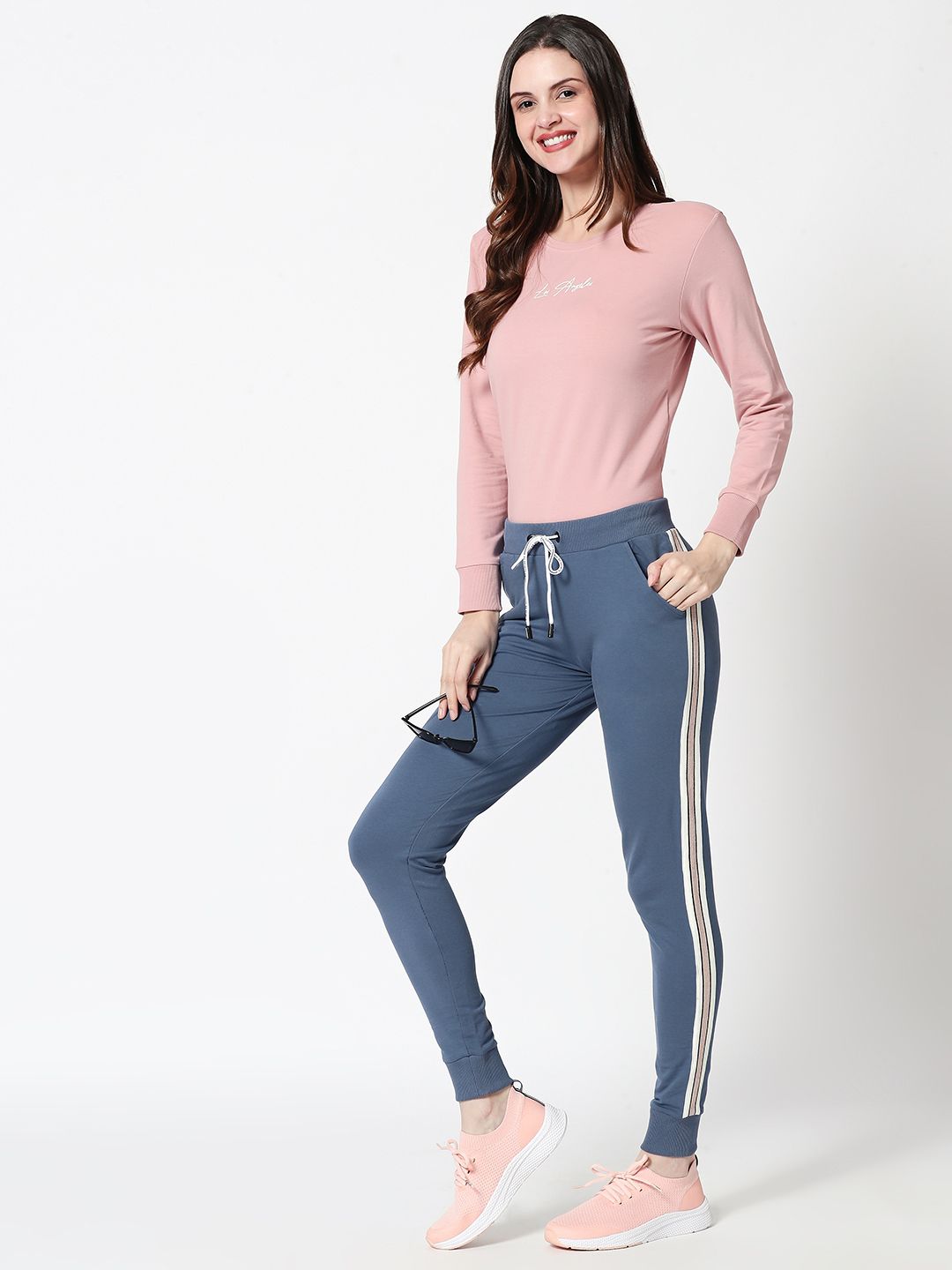 Zeyo Women Blue & White Solid Joggers Price in India