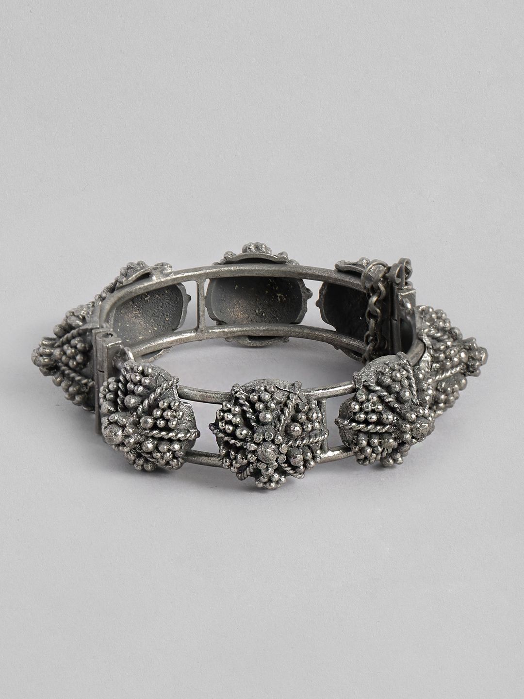 justpeachy Silver-Plated Oxidised Bangle-Style Bracelet Price in India