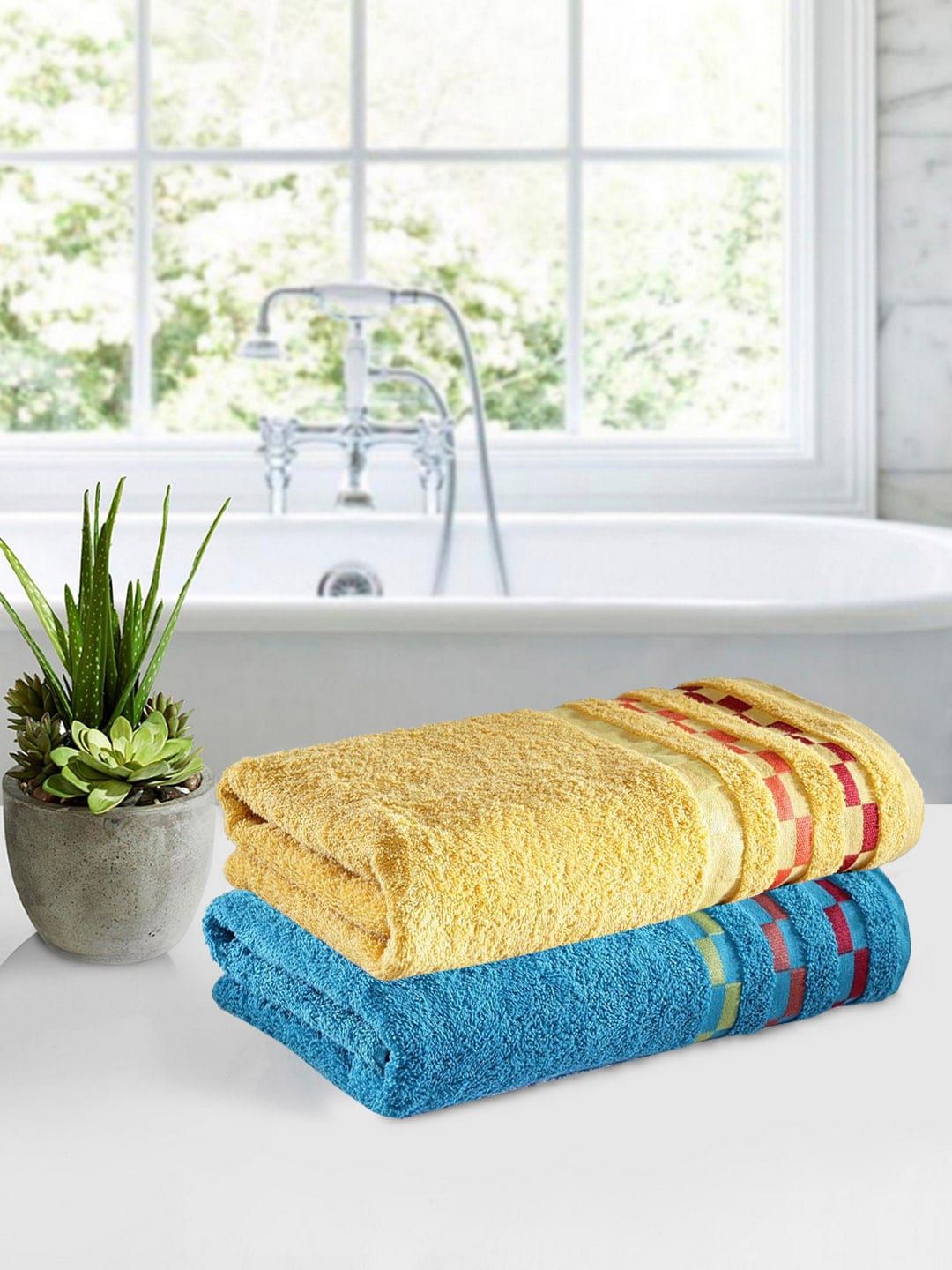 BIANCA Unisex Yellow & Blue Set of 2 Solid 450 GSM Bath Towels Price in India