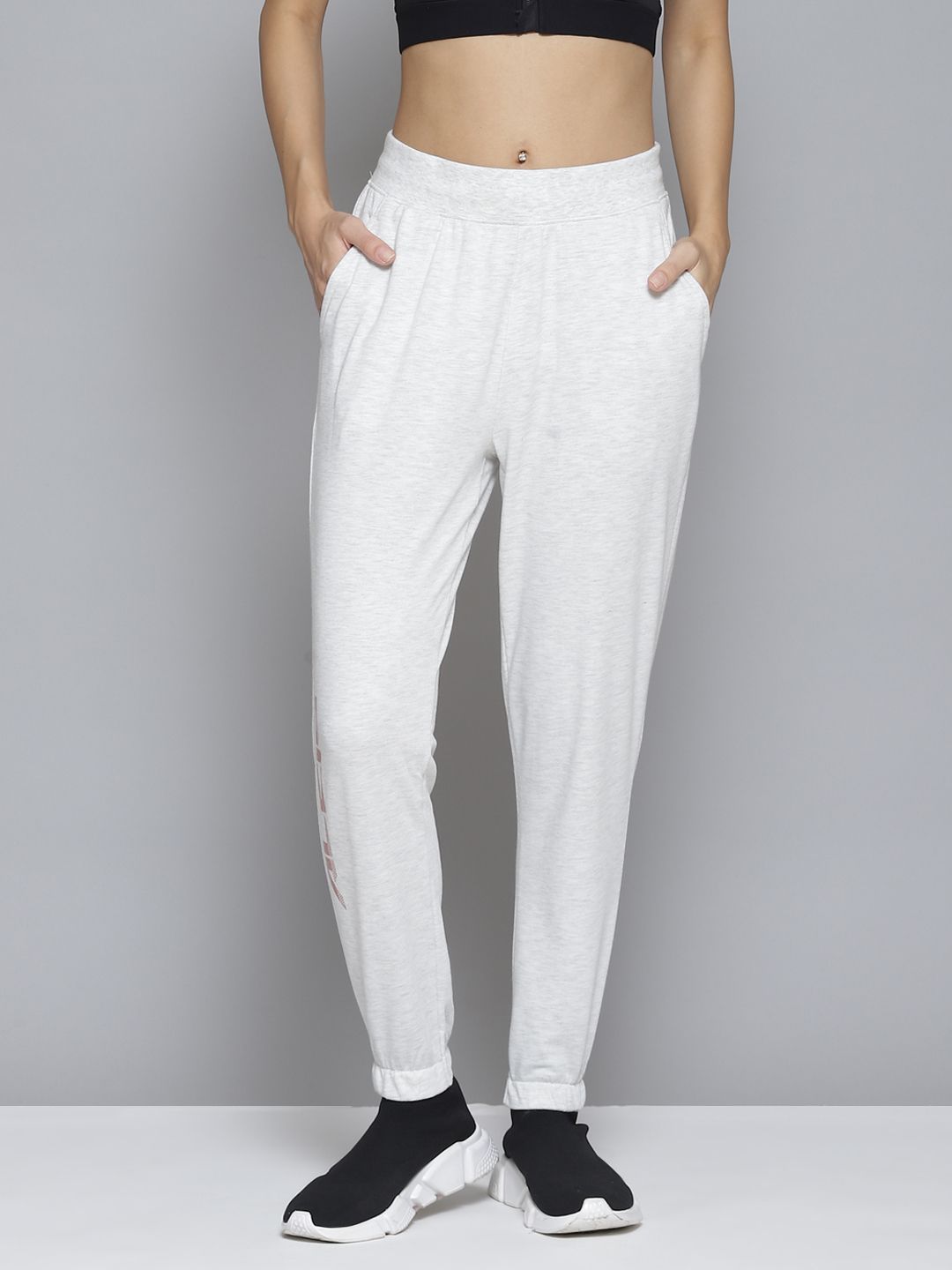 Alcis Women White Solid Slim-Fit Joggers Price in India
