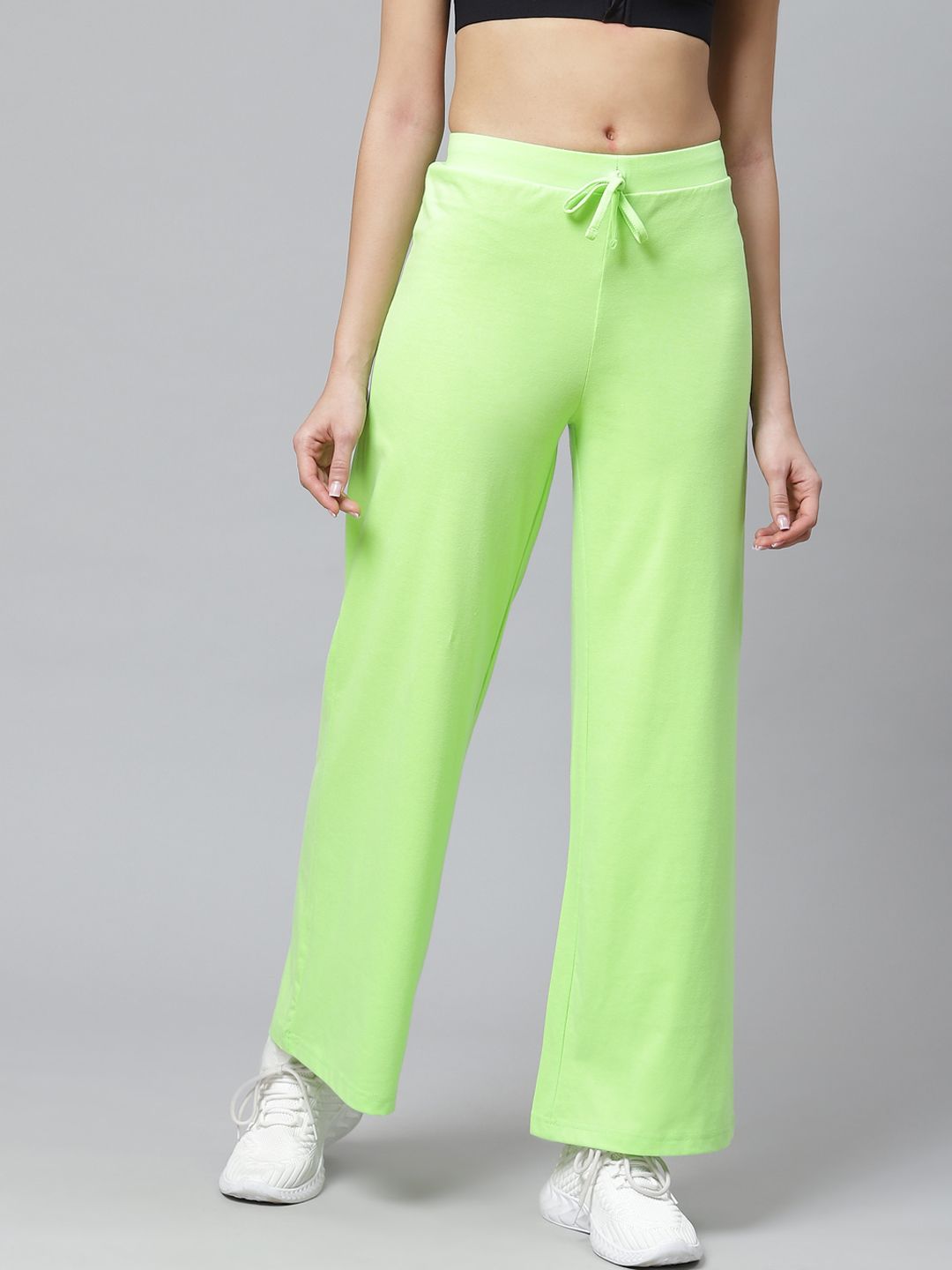 Hubberholme Women Neon Green Solid Track Pants Price in India