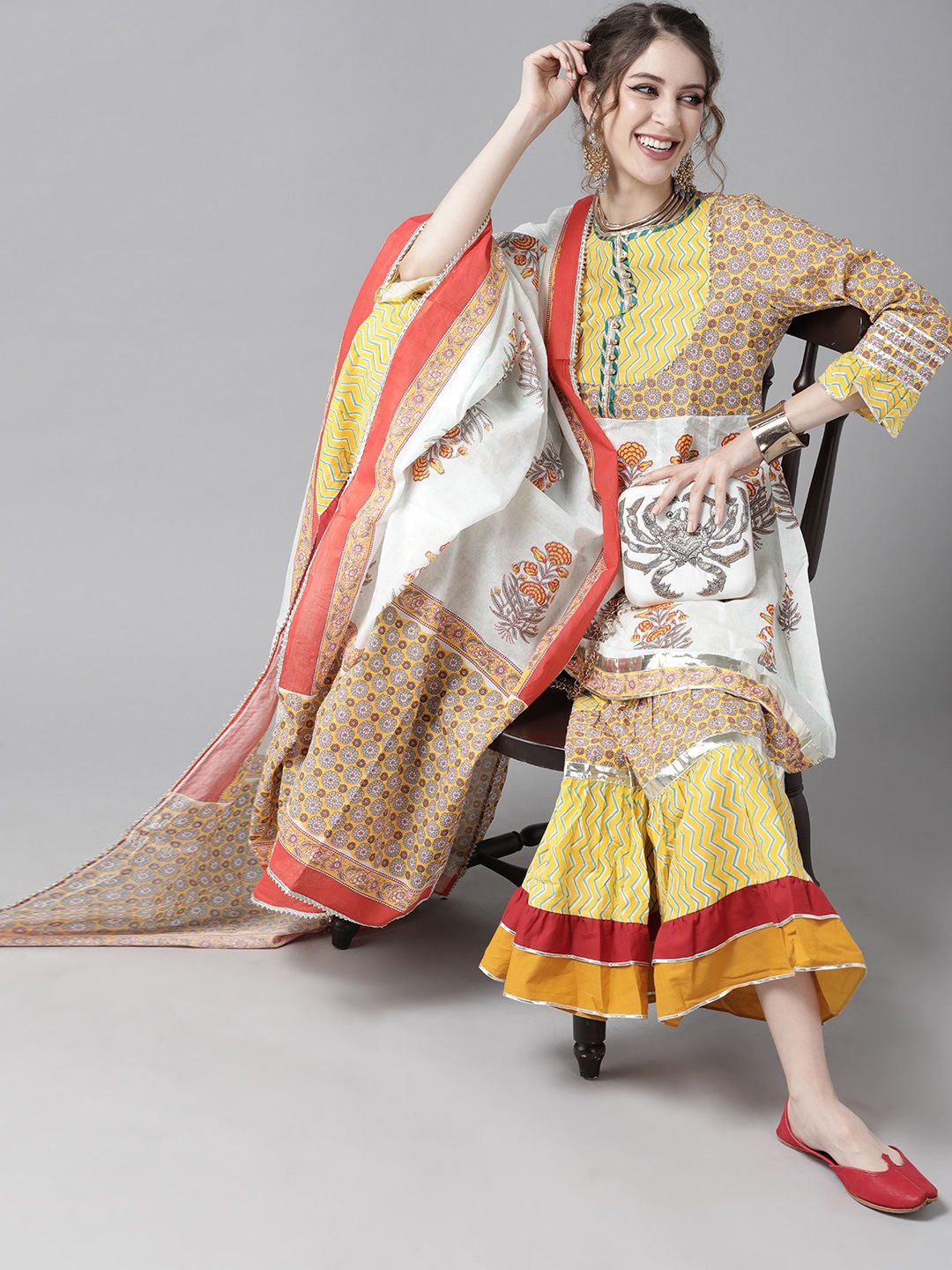 Ishin Women Yellow & Off-White Block Print Cotton Fusion Kurta with Sharara & Dupatta Price in India