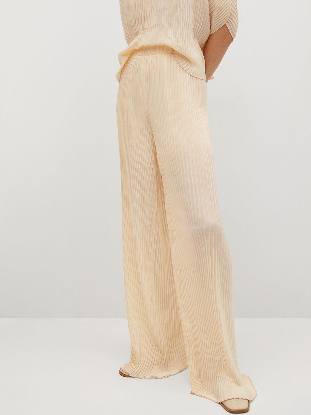 MANGO Women Cream-Coloured Self-Striped Flared Trousers Price in India