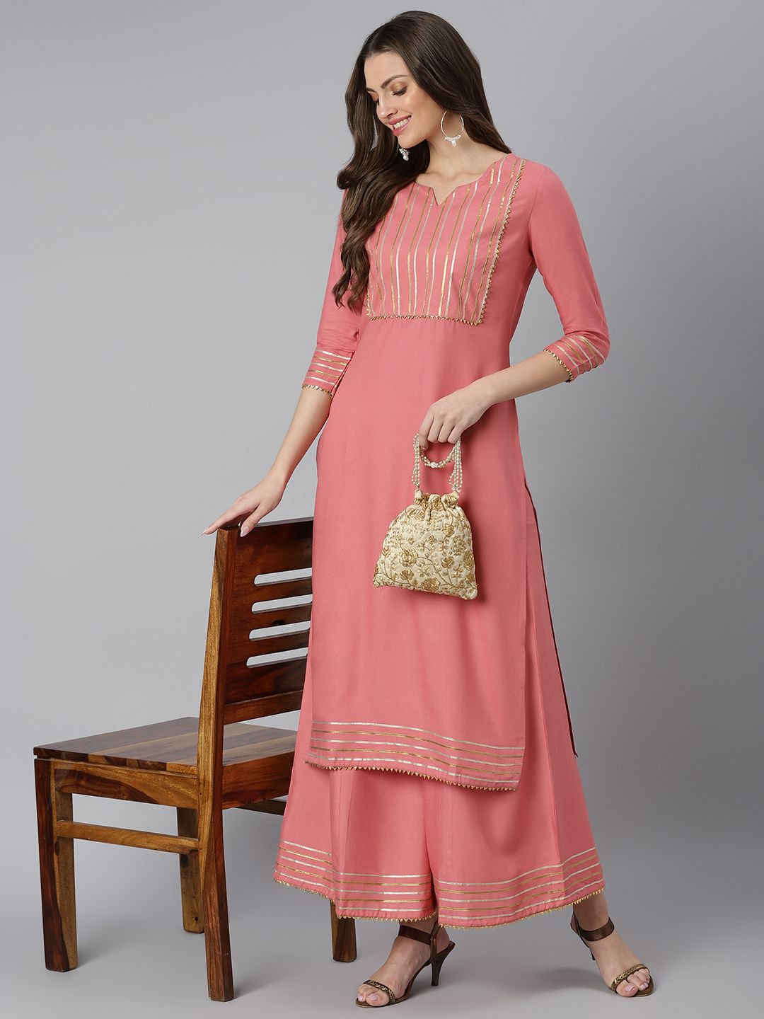 Khushal K Women Peach-Coloured Yoke Design Kurta with Palazzos Price in India