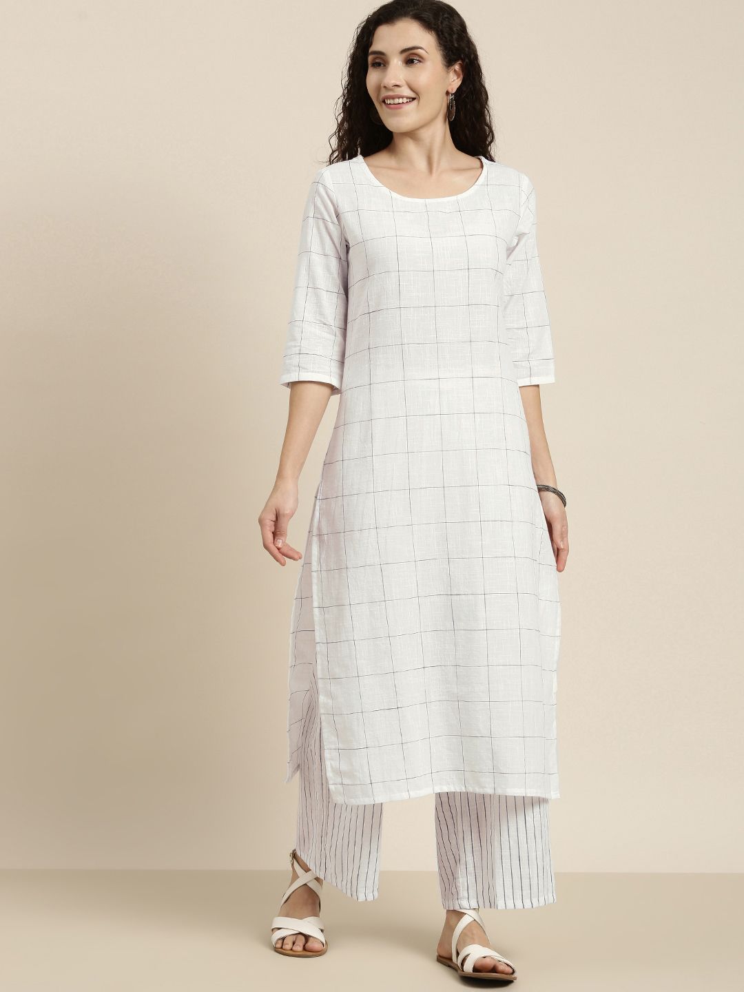 Vishudh Women Off-White & Black Checked Straight Kurta With Striped Palazzos Price in India